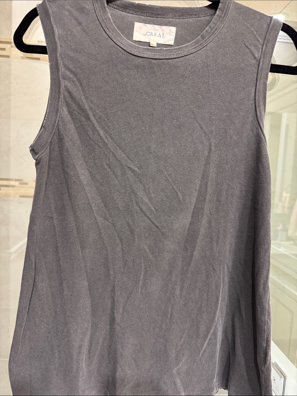 The Great Sleeveless Tank Top in Charcoal Gray 100% cotton. Distressed